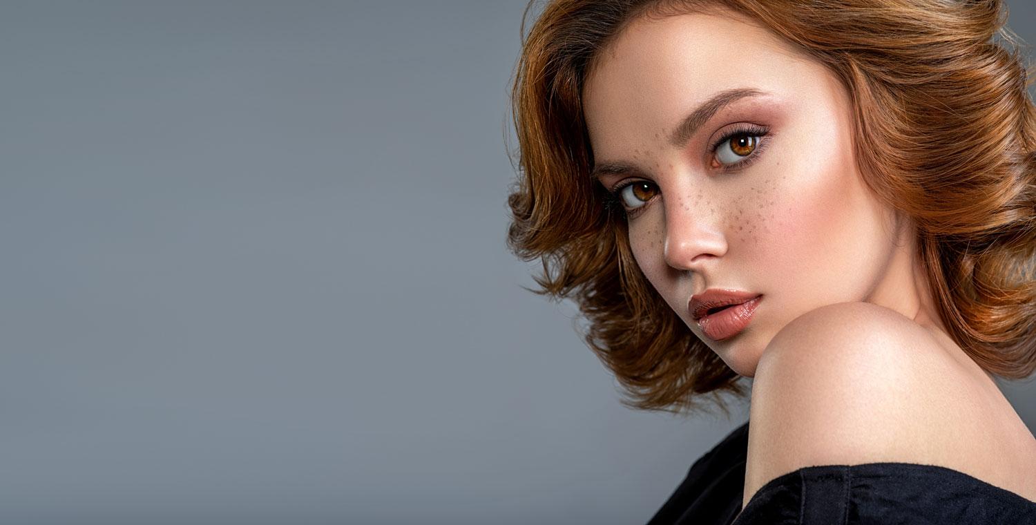 Woman with natural-looking freckles